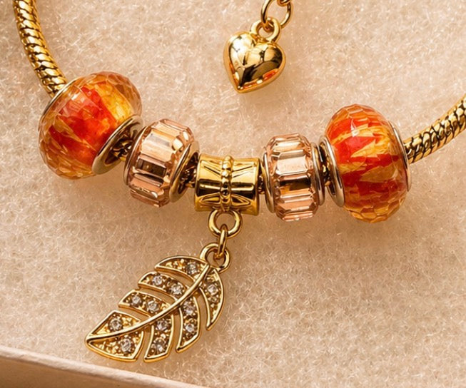 Gold Charm Bracelet – Snake Chain with Unique Designed Beads Overview - Orange